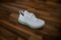 Adidas shoes Alphaedge 4D in white and green.