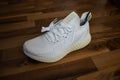 Adidas shoes Alphaedge 4D in white and yellow.