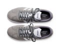 Adidas sneakers for running, football, training and skateboarding in white and gray