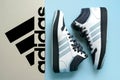 Adidas sport shoes Hoops 3.0 Mid Classic Basketball style with package box Royalty Free Stock Photo