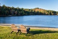 Adirondack Chairs in front of a Lake Royalty Free Stock Photo