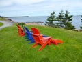 Adirondack chairs overlooking the sea on Prince Edward Island Royalty Free Stock Photo