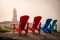 Adirondack chairs, Peggy's Cove Lighthouse, foggy evening, Nova Scotia, Canada