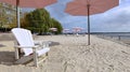 Adirondack chairs with pink umbrellas at Sugar Beach, Toronto