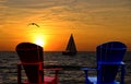 Adirondack chairs silhouette overlooking Lake Michigan Royalty Free Stock Photo