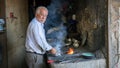 Ironsmith working in his workshop in Adiyaman city historical old Oturakci bazaar inside the old city, Turkey Royalty Free Stock Photo