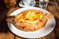 Adjarian khachapuri illuminated by sun in Batumi