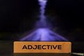 Adjective on the sticky notes with bokeh background Royalty Free Stock Photo