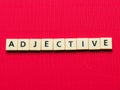 ADJECTIVE word made from square letter tiles Royalty Free Stock Photo