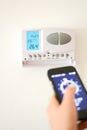 Adjust temperature in home interior with smartphone