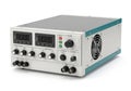 Adjustable dual channel programmable dc power supply unit with digital display Royalty Free Stock Photo