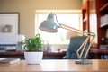 adjustable office lamp shining on desk