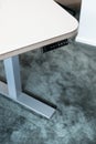 Adjustable office table with up, down and memory buttons on the remote control