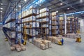 Adjustable pallet racking system in a warehouse