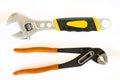 Adjustable pliers and Wrench on white background Royalty Free Stock Photo
