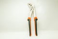 Adjustable plumbing and pipe wrench pincers. Isolated photo