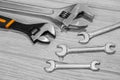 Adjustable spanners and wrenches on the table Royalty Free Stock Photo