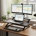 Adjustable stand supports the devices enhancing the work area with a Royalty Free Stock Photo