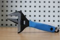 Adjustable wrench. Front view. Repair, plumbing