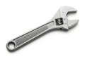 Adjustable wrench tool on a white surface Royalty Free Stock Photo