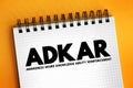 ADKAR - Awareness, Desire, Knowledge, Ability, Reinforcement acronym, business concept on notepad Royalty Free Stock Photo