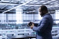 Admin in data center checking storage units and infrastructure components