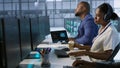 Admin in data center drinking coffee and implementing AI systems