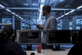 Admin in data center using tablet to check for server performance issues