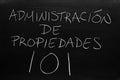 AdministraciÃÂ³n De Propiedades 101 On A Blackboard.  Translation: Property Management 101 Royalty Free Stock Photo