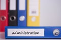 Administration on blue business binder Royalty Free Stock Photo
