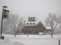 Administrative building in heavy Snow Storm UWM Royalty Free Stock Photo