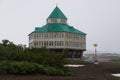 Administrative building of the Mutnovskaya geothermal power station in Kamchatka in the fog in summer general view
