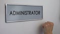 Administrator office door, worker hand knocking, corporate ethics, bureaucracy