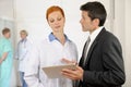 Administrator talking with Doctor at the Hospital Royalty Free Stock Photo