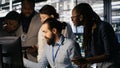 Admins doing brainstorming in server hub, reviewing machine learning code Royalty Free Stock Photo