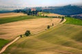 Admirable misty Tuscany landscape with rural curved road, Italy Royalty Free Stock Photo