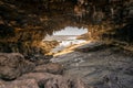 Admirals arch view at sunset with orange dramatic light and stalactites on Kangaroo island in Australia