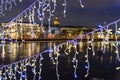 Admiralty embankment and St Isaac`s Cathedral view from Palace bridge decorated at night. Saint Petersburg. Russia Royalty Free Stock Photo