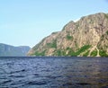 Admiring the beautiful view from the tour boat at the fjords of the Western brook pond