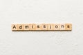 admissions word written on wood block. admissions text on table, concept Royalty Free Stock Photo