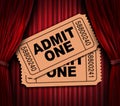 Admit one movie tickets on red drapes Royalty Free Stock Photo