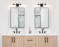 A modern bathroom with a wood cabinet and white marble countertop. Royalty Free Stock Photo