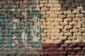 adobe brick wall, dirty abandoned paint, painted with grafity, wall background Royalty Free Stock Photo