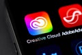 Adobe Creative Cloud mobile icon app on a screen smartphone iPhone closeup Royalty Free Stock Photo