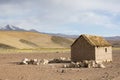 Adobe house on Bolivian Altiplano with Andean mountain, Bolivia Royalty Free Stock Photo