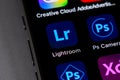 Adobe Lightroom mobile icon app on a screen smartphone iPhone closeup. Adobe Systems Incorporated is an American multinational Royalty Free Stock Photo