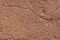 Adobe Wall Texture background with random cracks Royalty Free Stock Photo