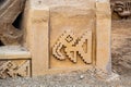 adobe walls and decorations in the archaeological site of Chan Chan made by the Chimu civilization near Trujillo, Peru