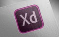 Adobe-xd-1_1 on paper texture Royalty Free Stock Photo
