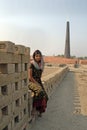 Adolescent girl in brick-field